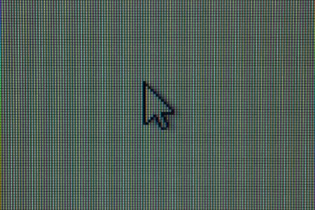 Real photo macro detail of mouse cursor on LCD display with RGB pattern visibleの写真素材