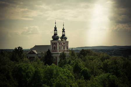 Christianity concept showing sun beam next to churchの写真素材