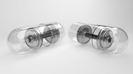 Weight loss pills dumbbells metaphoreの写真素材