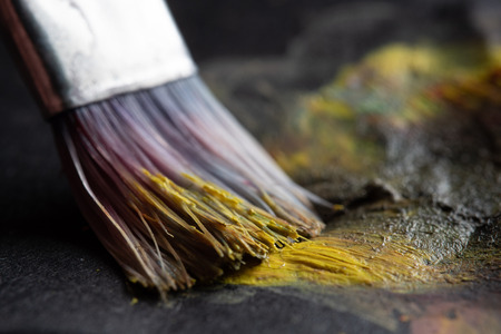 Paintbrush mixing colors extreme macro close-up shotの写真素材