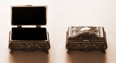 Two silver ancient casket opened and closedの写真素材