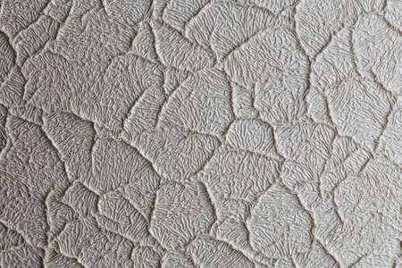textured pattern on a white clay potの写真素材