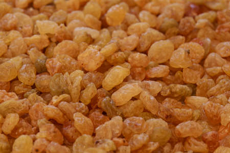 golden raisin, raisin photo, yellow raisin, brown raisin, dry raisin, raisin background, raisin texture, white raisin, green raisin, raw raisin, vegetarian organic foodの写真素材