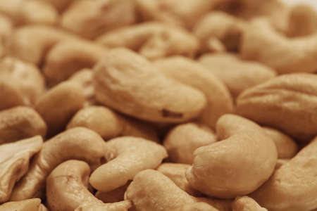 Cashew nuts pile closeup, food macro photoの写真素材