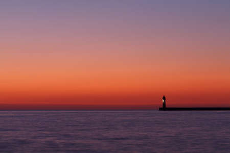 lighthouse on sunsetの写真素材