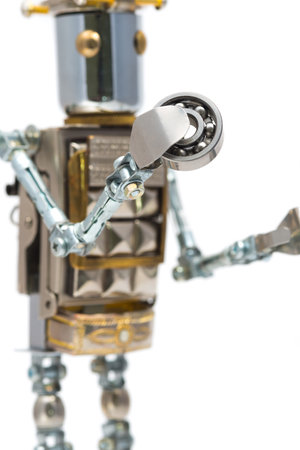 Steampunk robot holding bearing. Cyberpunk style. Chrome and bronze parts.の写真素材