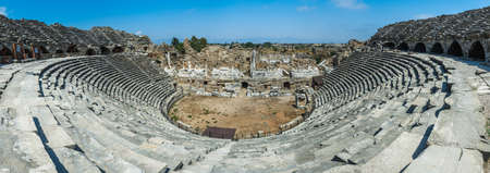 Old amphitheater in Side, Turkey. Panorama view photo. Ruins of ancient cityの写真素材