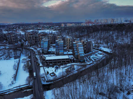 Aerial view of residental complex Novogorsk Olympic village in the evening at sunset. River like a border, beautiful view from the sky.の写真素材