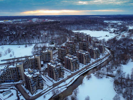Aerial view of residental complex Novogorsk Olympic village in the evening at sunset. River like a border, beautiful view from the sky.の写真素材