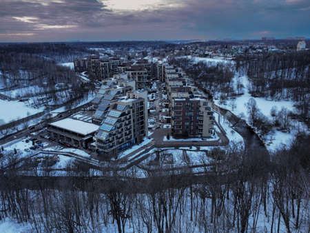 Aerial view of residental complex Novogorsk Olympic village in the evening at sunset. River like a border, beautiful view from the sky.の写真素材