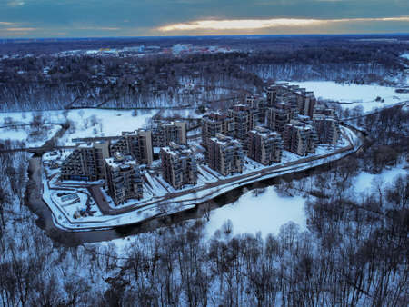 Aerial view of residental complex Novogorsk Olympic village in the evening at sunset. River like a border, beautiful view from the sky.の写真素材