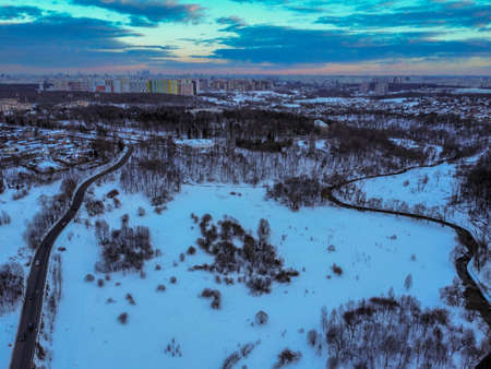 Aerial view of residental complex Novogorsk Olympic village in the evening at sunset. River like a border, beautiful view from the sky.の写真素材