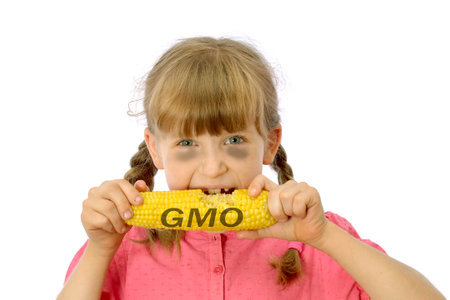 kid, child eating GMO vegetablesの写真素材