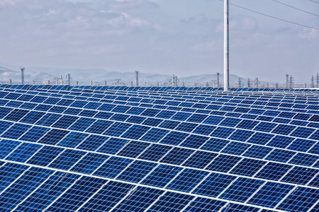 solar panels with the sunny sky. Blue solar panels. background of photovoltaic modules for renewable...