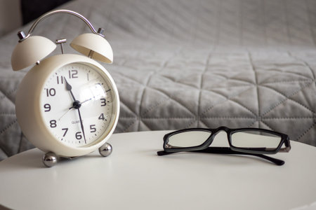 Bedside Timepiece Combined With Spectacles For Convenience And Styleの写真素材