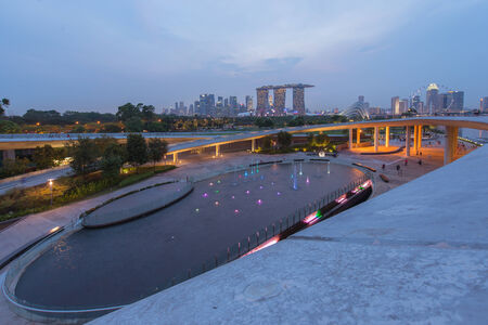 Panorama of Singapore skyline illuminated in the evening twilightのeditorial素材