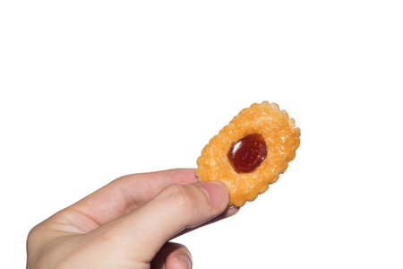 men hand holding biscuit