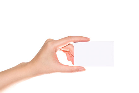 Female hand with a blank card isolated on white
