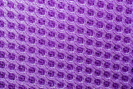 magenta background. Mesh fabric texture. Macro perspectiveの写真素材