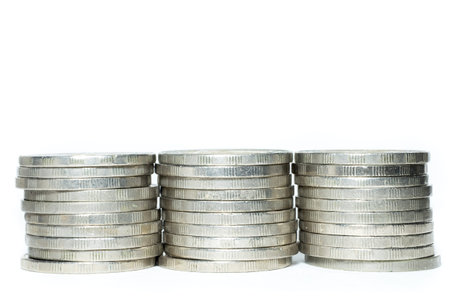 Three stacks of coin isolate on white background
