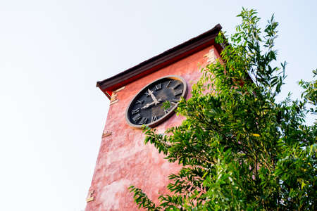 red vintage clock towerの写真素材