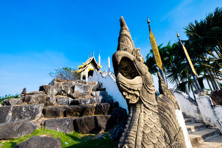 king of Nagas andBeautiful Thai Temple with blue skyの写真素材