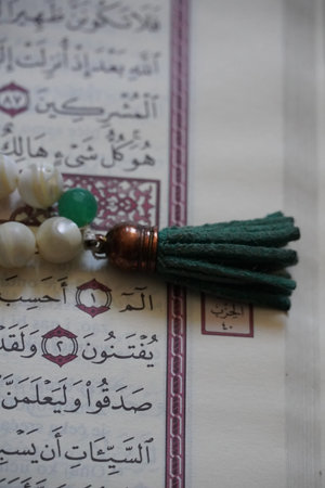 Holy book of Quran, Ramadan concept, with Tespih