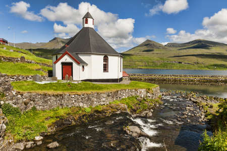 Small village church in Haldorsvik in the Faroe Islandsの写真素材