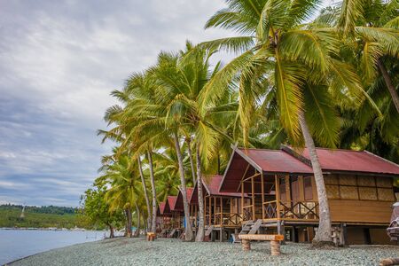 View Bungalow in Indonesia Village Tropical Beach in Bali Island Sunset.Romantic Viewpoint.Summer Season Caribbean ocean. Horizontal Pictureの写真素材