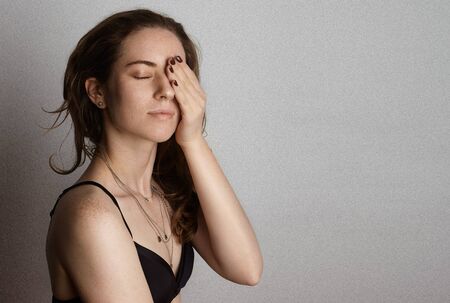 Portrait Handsome Pretty Young Woman Long Hair Empty White Background.Beauty,Grooming,Fashion People Photo.Sexy Girl Smiling Closed Eyes Camera Studio Shot.Horizontal Imageの写真素材