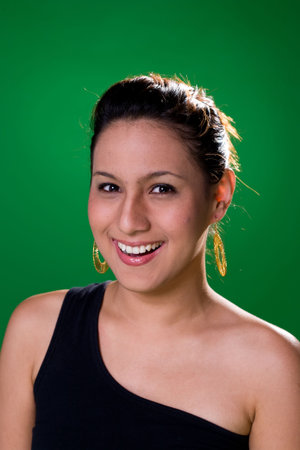 smiling girl on green backgroundの写真素材