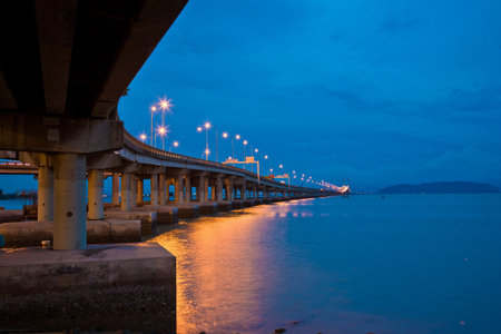 Penang bridge view in the evening with deep blue sky and seaの写真素材