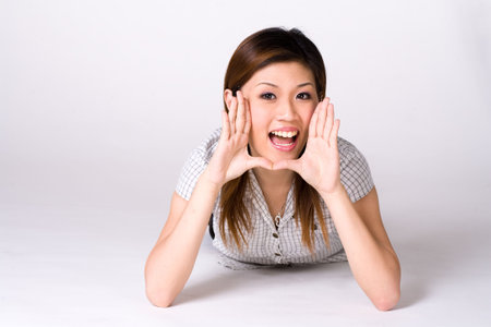 young woman with a happy expressive faceの写真素材
