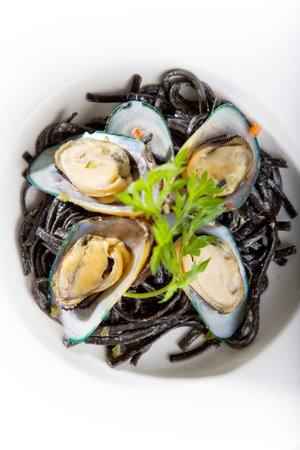 seafood meal of oysters serve with noodles