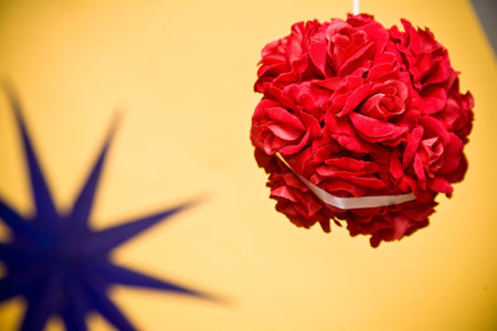 roses bouquet ball hanging as decoration on wedding celebrationの写真素材