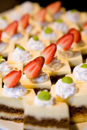 rows of desserts display on the table for special occasionの写真素材