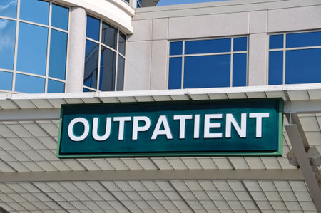 Outpatient Sign over a Hospital Outpatient Services Entranceの写真素材