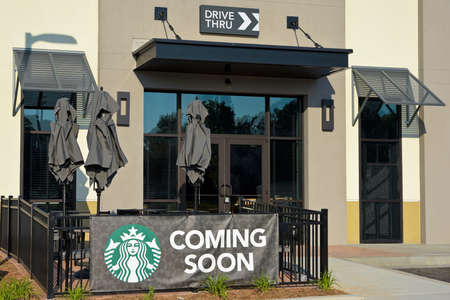 Villa Rica, GA / USA - May 13, 2018 - Coming Soon sign displayed in front of a New Starbucks Coffee Shop getting ready to open.のeditorial素材