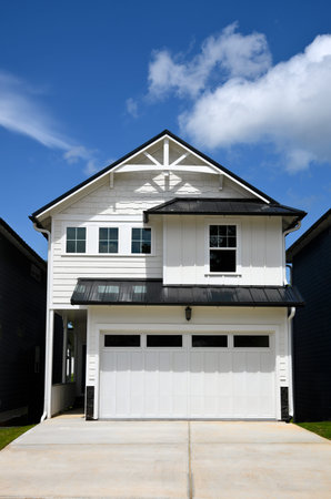 New White Craftsman Style Townhouse with Black Metal Roof