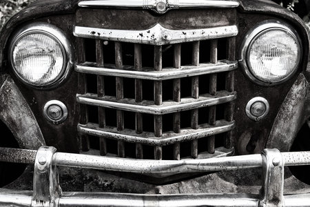 Close-up Image of the Front of an Old Scrap Truck in a Junk Yardの写真素材