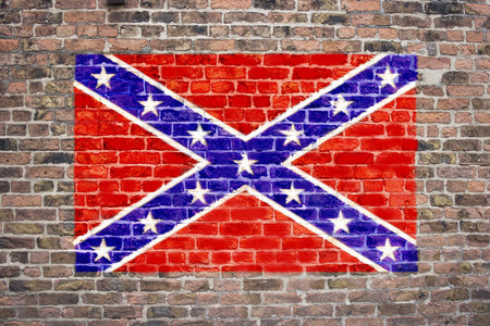Confederate flag sprayed on brick wall