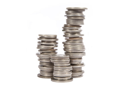 Stacked old silver coins