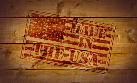Made in the USA stamp on wooden backgroundの写真素材
