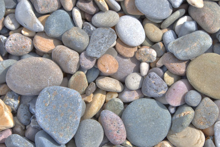 Background photo  Colorful stones on a beach 