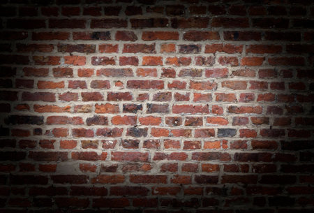 Old brick wall with dark vignette edgeの写真素材
