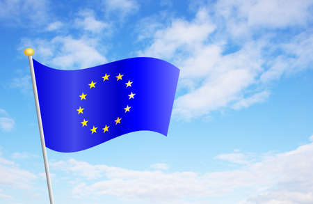 European Union flag against cloudy blue sky backgroundの写真素材