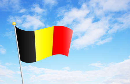 Belgian flag against cloudy blue sky backgroundの写真素材