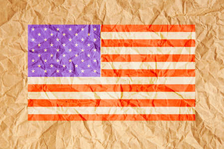 United States of America, USA flag. American flag on crumpled brown paper background.の写真素材