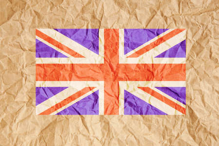 United Kingdom, UK flag on crumpled brown paper background.の写真素材