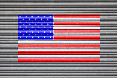USA Metal Shutter. American flag on metal roller shutter doorの写真素材